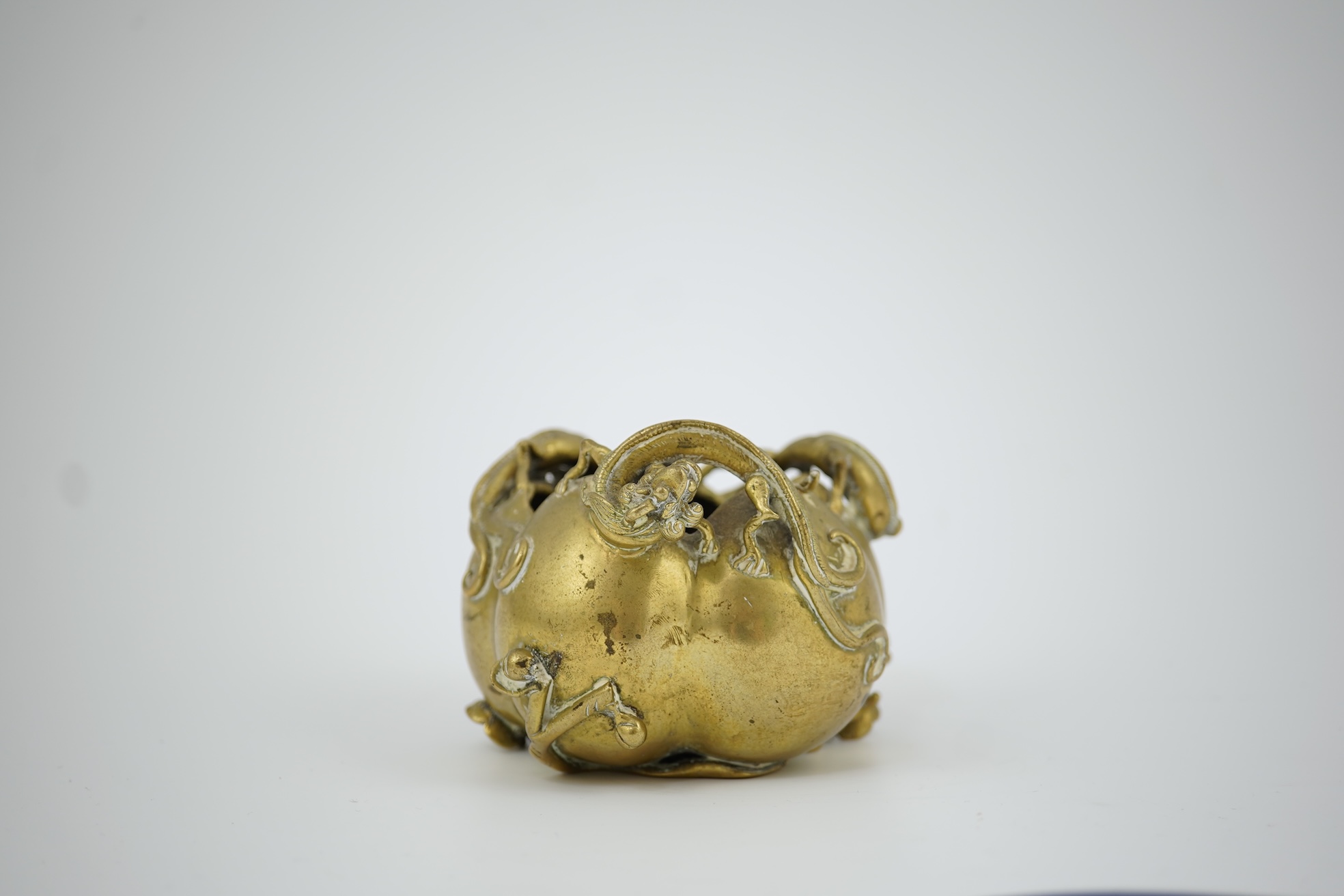 A large Chinese bronze rectangular censer and cover, Xuande seal mark, and a ‘plum blossom and chilong’ bronze censer, both 19th century